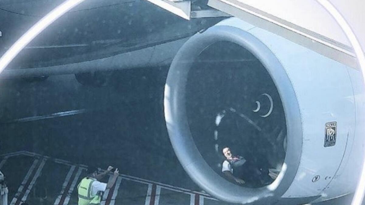 Airport worker causes stir for photo inside plane engine - News ...
