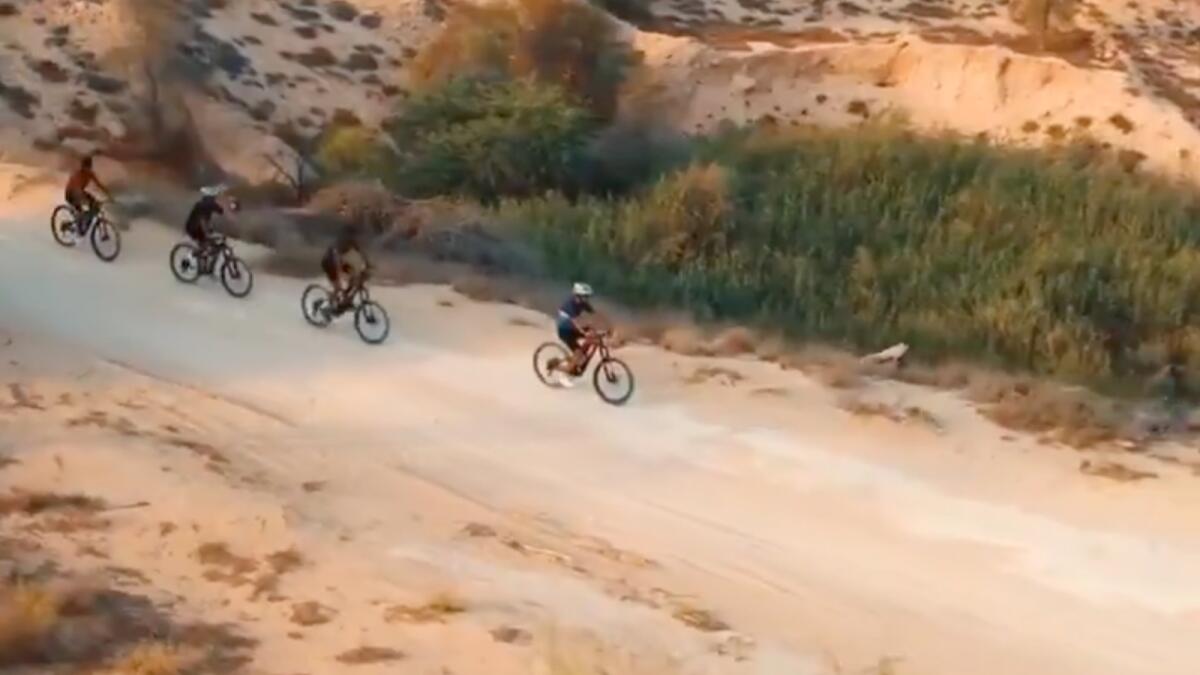 Video: Incredible new mountain bike trail offers Dubai desert views ...