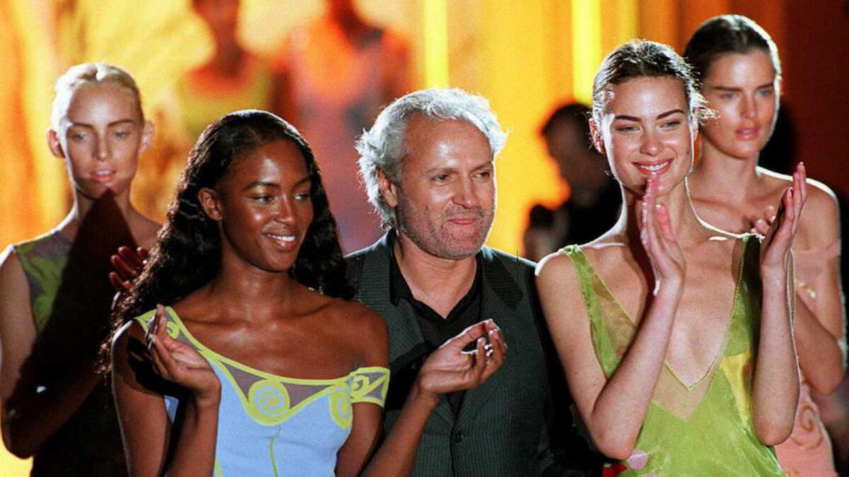 What are Gianni Versace's most famous dresses? From Liz Hurley's safety pin  frock to Donatella's belt dress