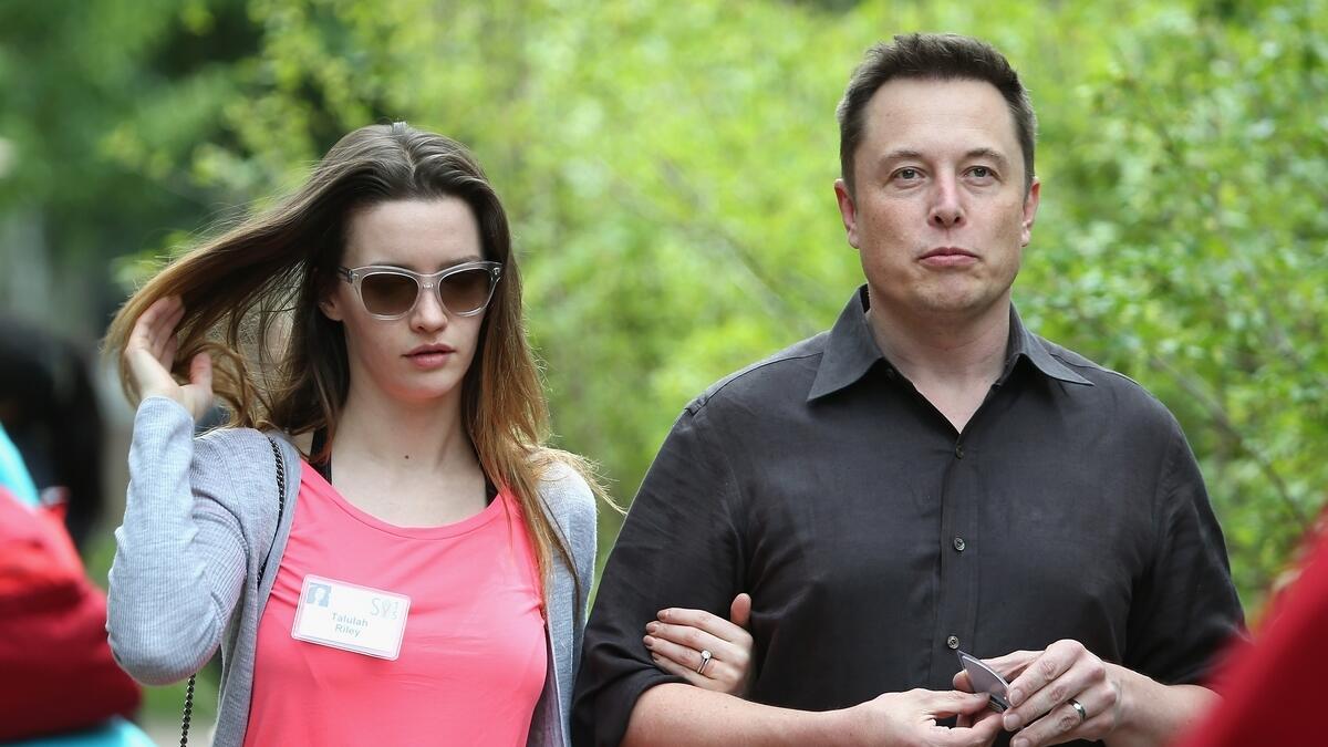 Elon Musk's ex-wife told his biographer that deep inside the Tesla CEO 'is  this manchild still standing in front of his father