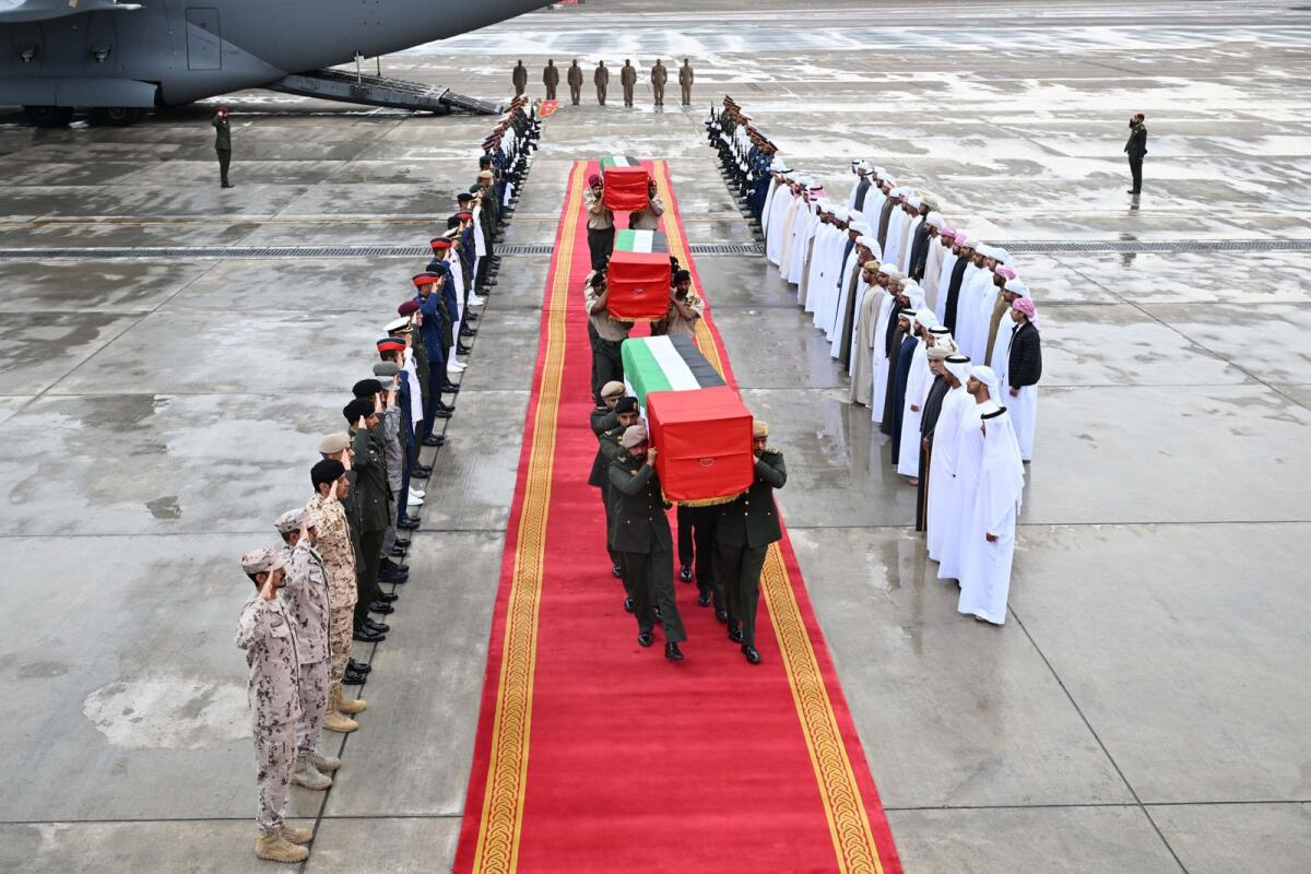 Photos: Bodies of UAE soldiers killed in Somalia arrive at Al Bateen Airport - News | Khaleej Times