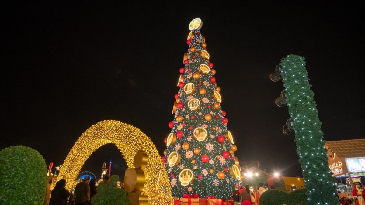 Look: Santa skydives into Dubai's Global Village to light up giant  Christmas tree, launch fireworks - News | Khaleej Times