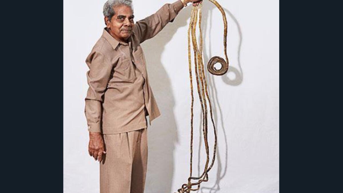 Indian man with world's longest fingernails set to cut them after 66 years  - News | Khaleej Times