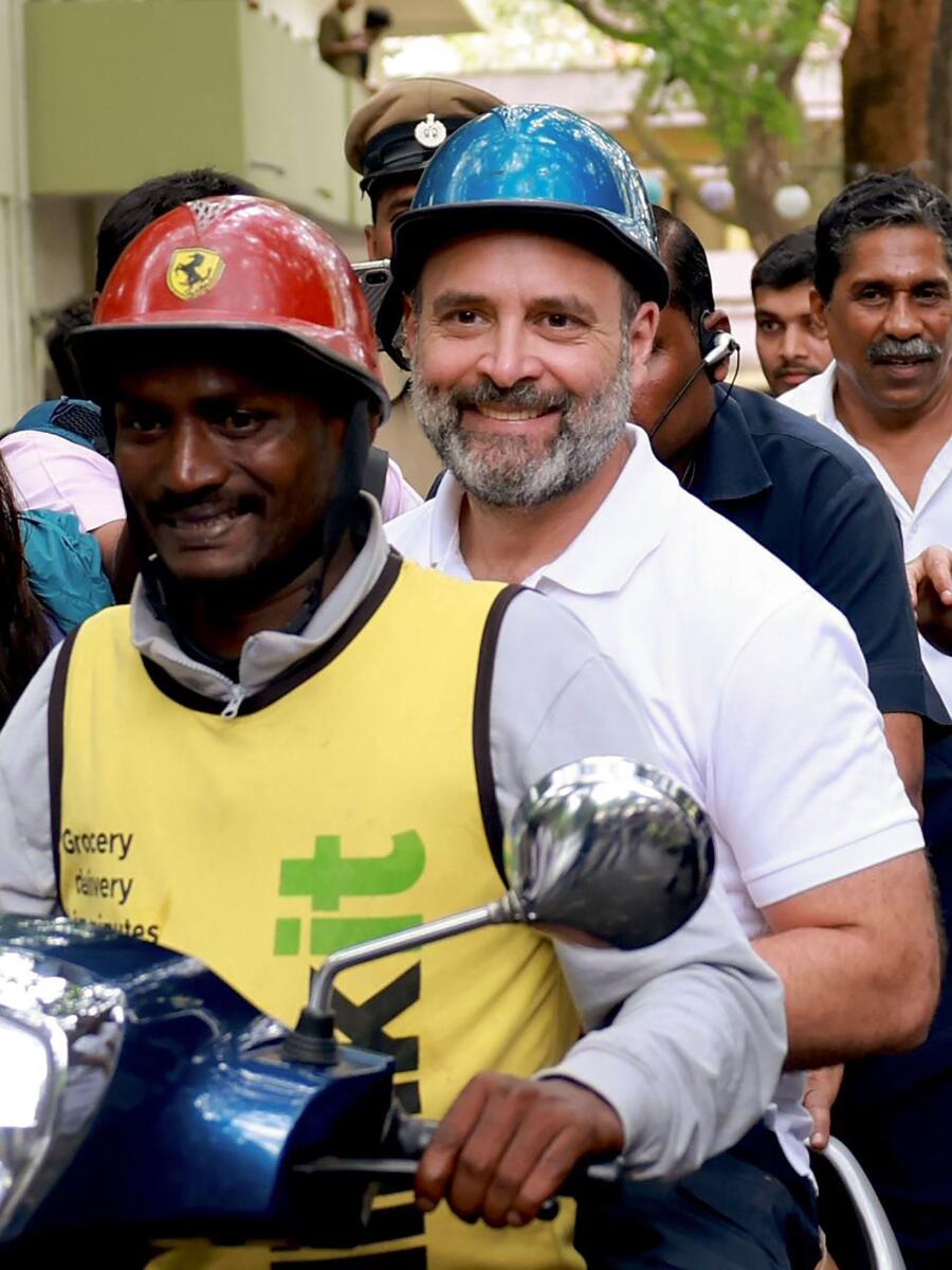 India: Rahul rides pillion on delivery boy's scooter in Bengaluru - News |  Khaleej Times