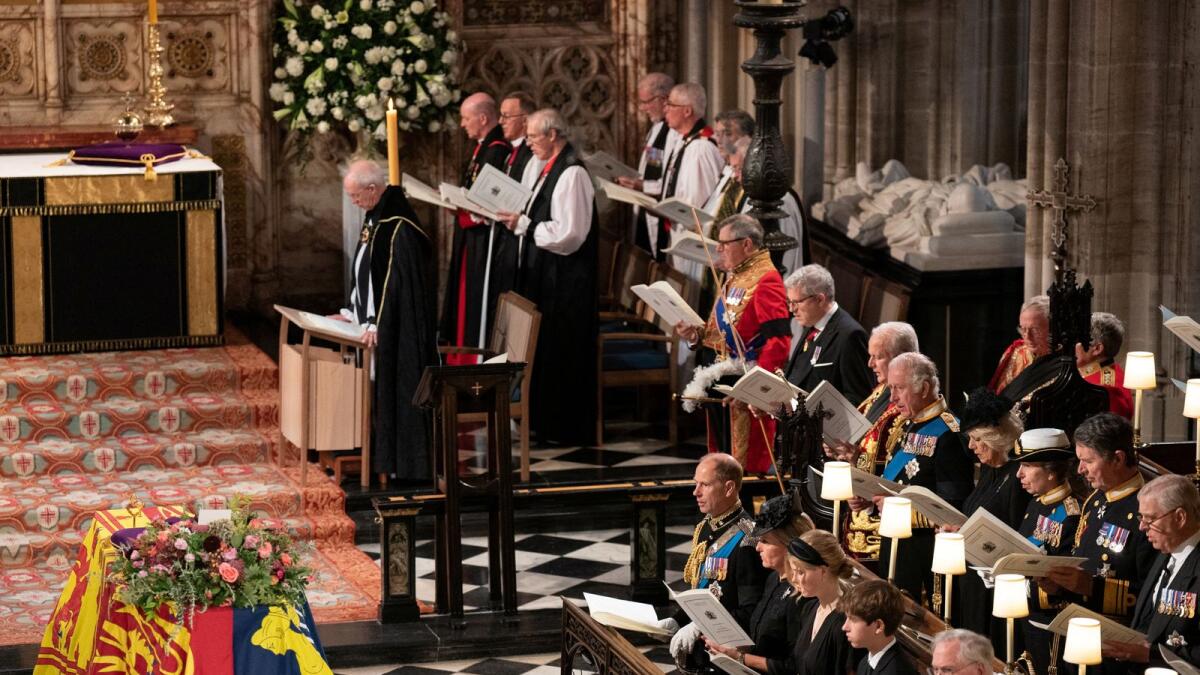The televised service started with royals, prime ministers and former and current members of the queen's household attending. After about 45 mins, the Queen's coffin was lowered into the royal vault to a lone piper's lament.