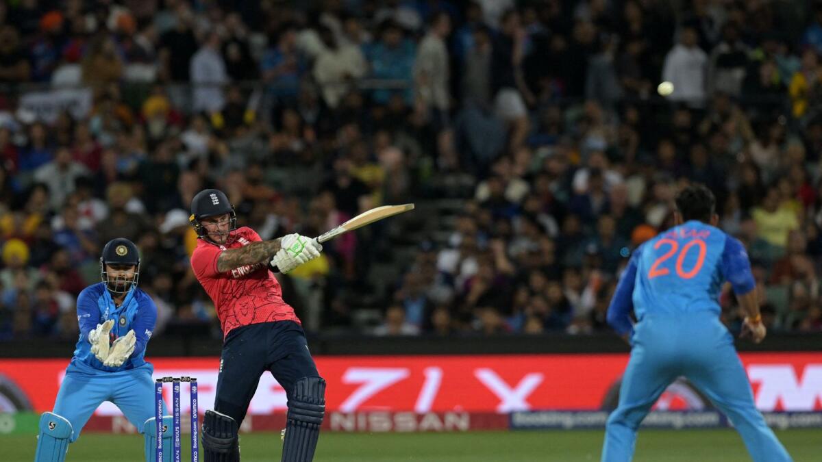 England's Alex Hales (centre) hits a six off India's Axar Patel (right) as wicketkeeper Rishabh Pant looks on during the T20 World Cup semifinal at the Adelaide Oval on Thursday. — AFP