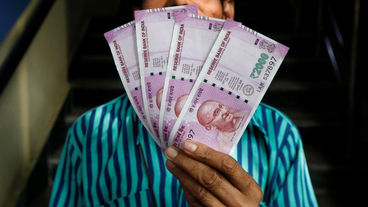 indian rupee hits record low; may fall to 82 against dollar - news | khaleej times
