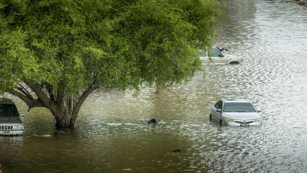 Vehicle submerged in water during floods in Fujairah. — File photo by Shihab