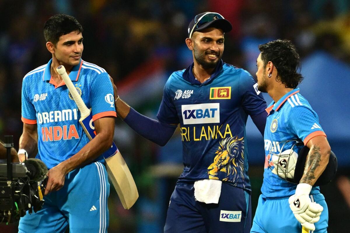 Sri Lanka's captain Dasun Shanaka (C) congratulates India's Shubman Gill (L) and Ishan Kishan at the end of the Asia Cup 2023 final cricket match between India and Sri Lanka at the R. Premadasa Stadium in Colombo on September 17, 2023. Photo: AFP