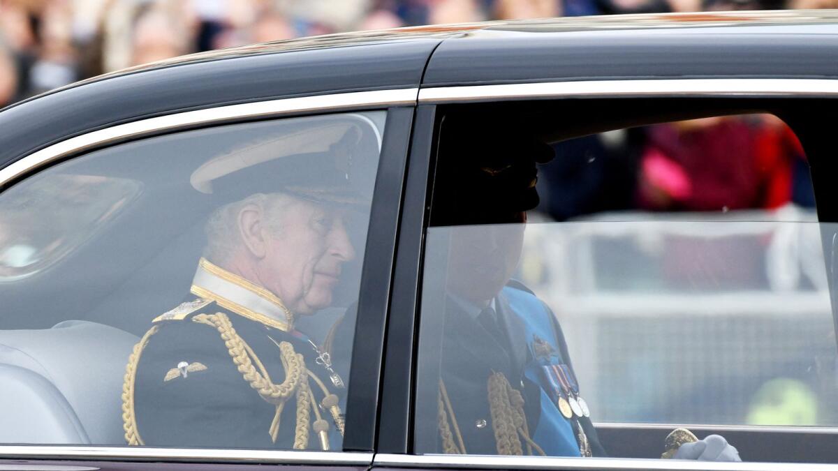 King Charles III and Prince William arrive at the abbey.