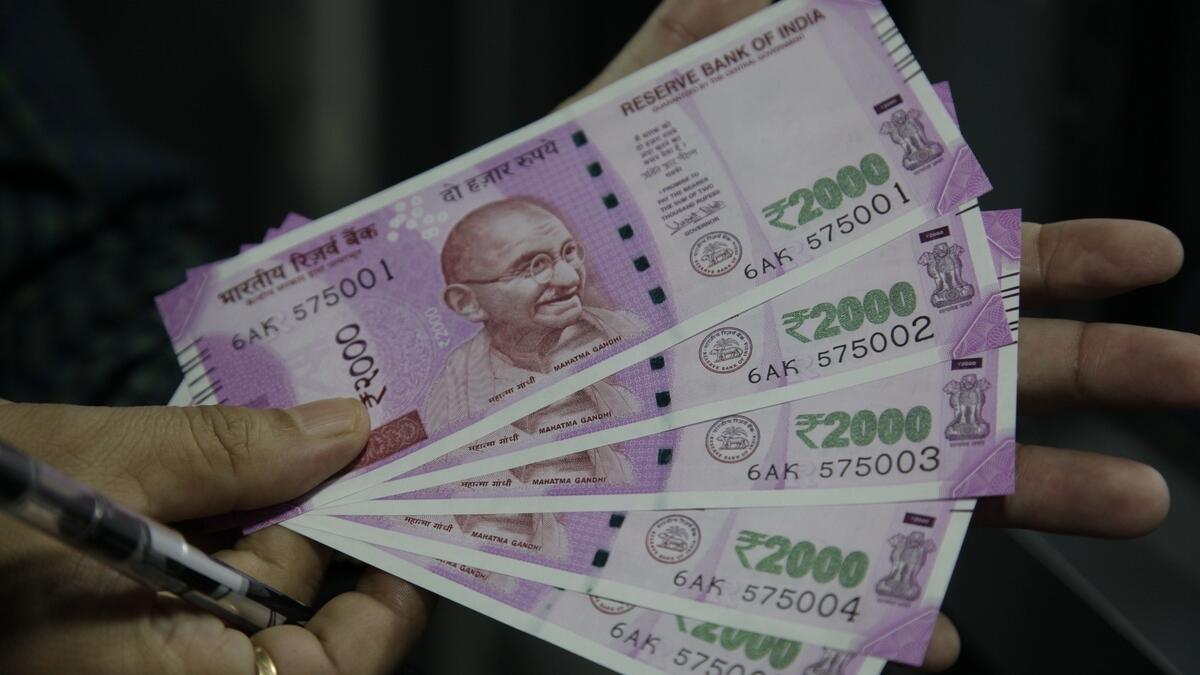indian rupee gains against uae dirham in early trade - news | khaleej times