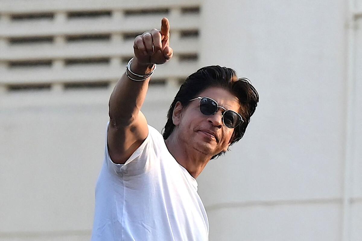 Shah Rukh Khan claps back at cheeky netizen who asked him how much Pathaan  made - News | Khaleej Times