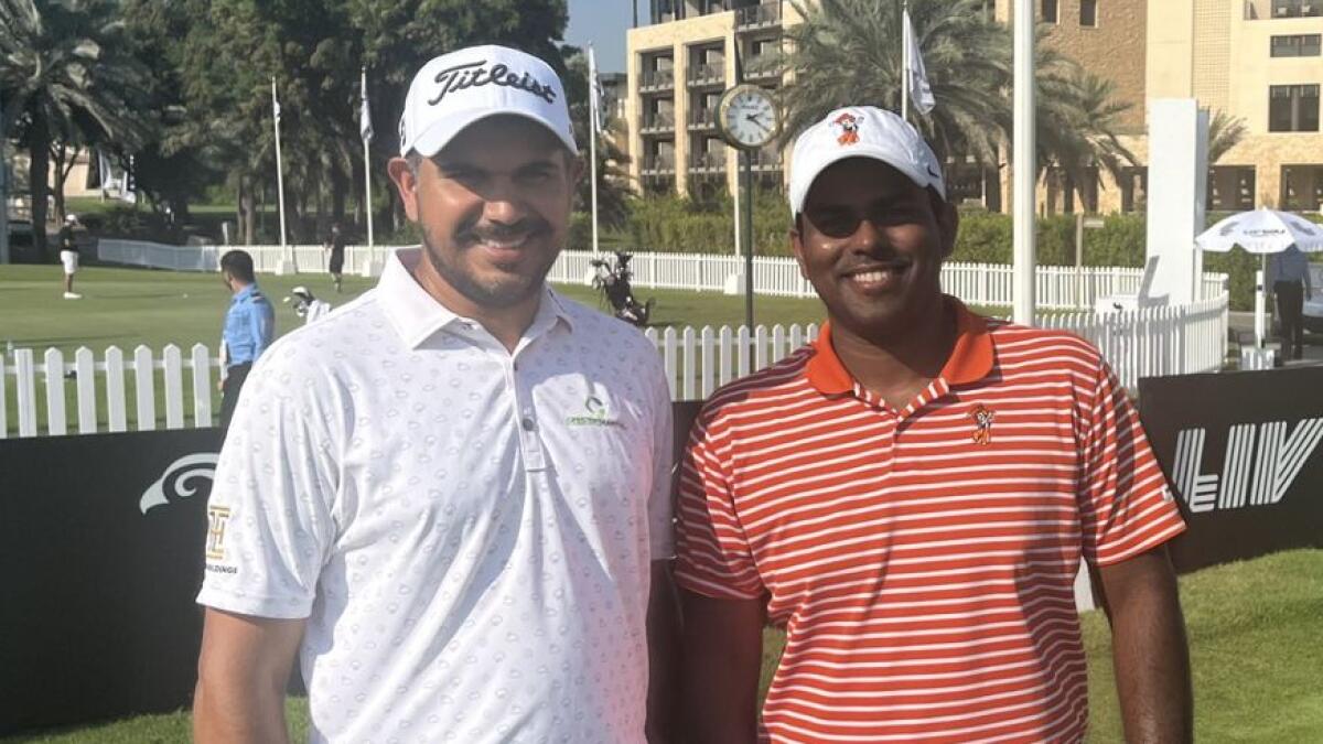 Rayhan Thomas (right) at Abu Dhabi Golf Club for the LIV Golf Promotions with Indian golf star Gaganjeet Bhullar. - Photo by Nick Tarratt