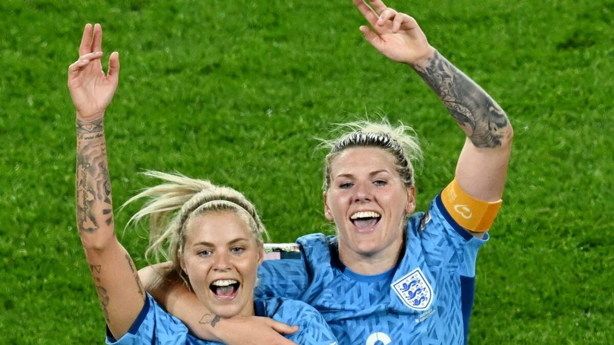 England's Rachel Daly and Millie Bright celebrate after beating Australia in the semifinals.  - Reuters