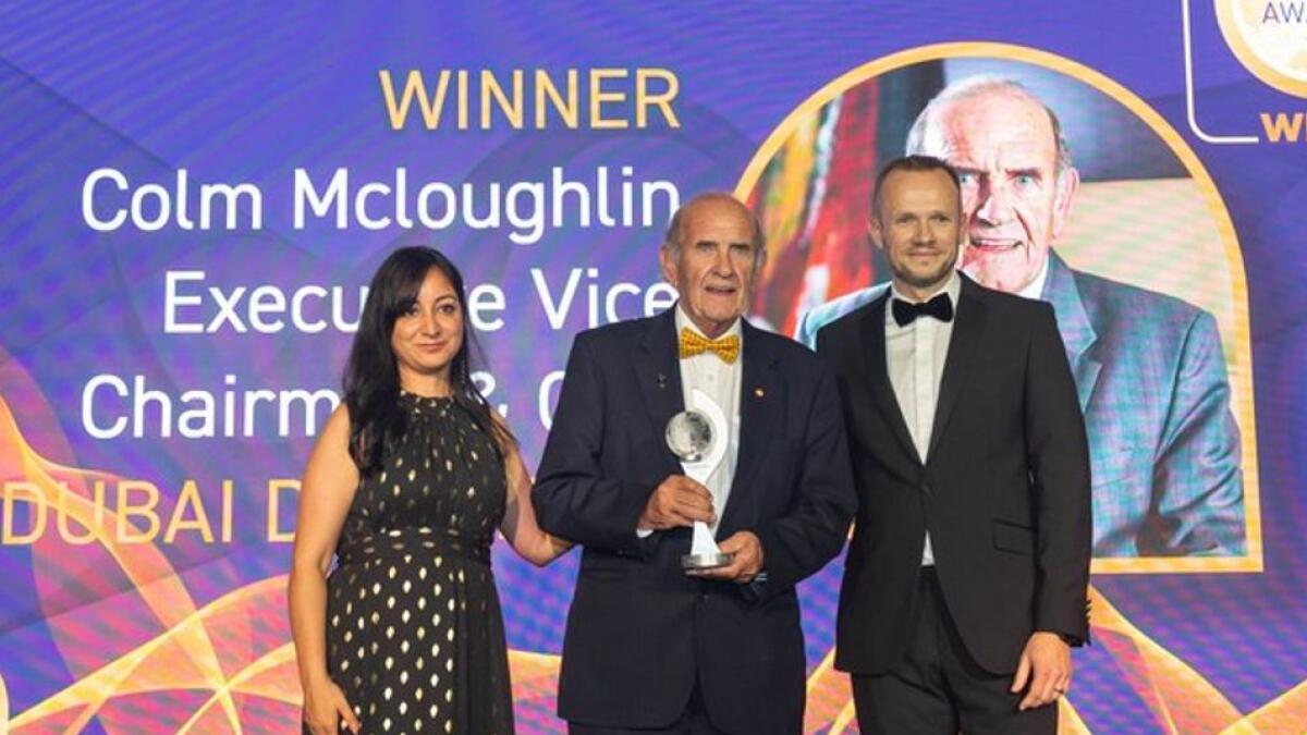 DFNI Frontier Editor Kapila Ireland and Publisher Felix Barlow, presenting the inaugural ‘Frontier Pioneer Award’ to Colm McLoughlin in recognition of his pioneering leadership at the helm of Dubai Duty Free for the past 40 years. - Supplied photo