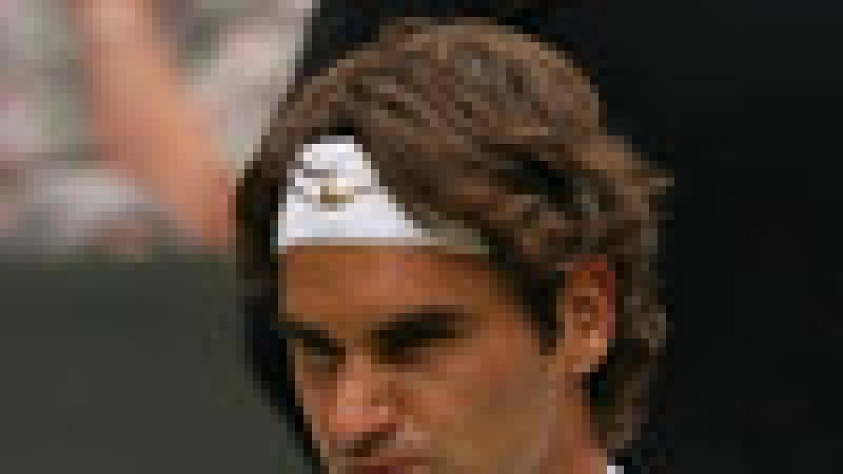 Federer survives scare to edge past Falla