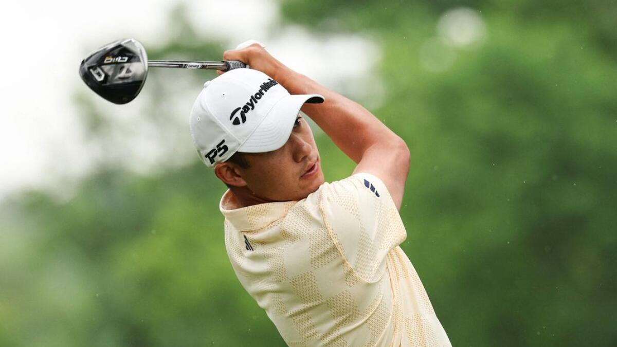 Second placed Collin Morikawa of the United States plays his shot from the 12th tee. - AFP
