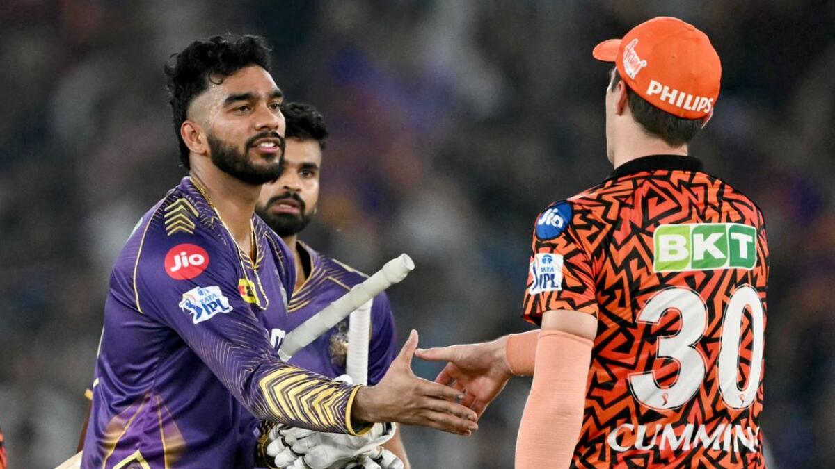 Kolkata Knight Riders' Venkatesh Iyer iand captain Shreyas Iyer are congratulated by his Sunrisers Hyderabad's Pat Cummins after their team's win at the Indian Premier League;s first qualifier.