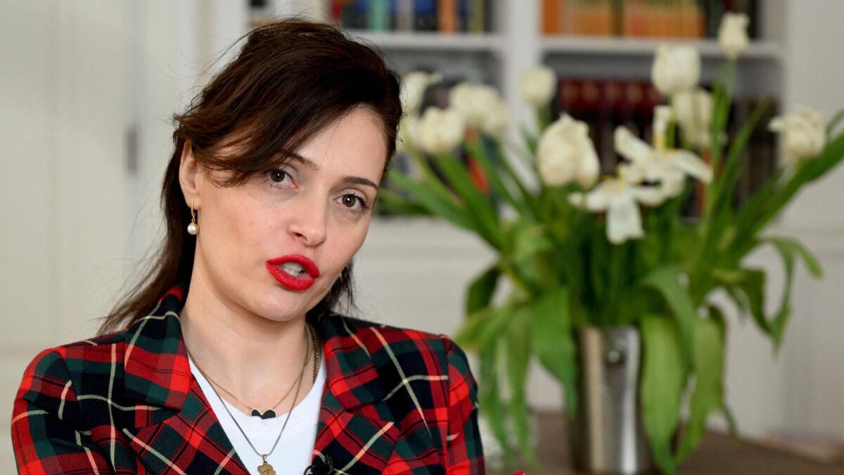 Georgian journalist Tamuna Museridze, who runs a Facebook group dedicated to reuniting babies stolen from their parents, speaks during an interview in Tbilisi on March 20, 2024. — AFP