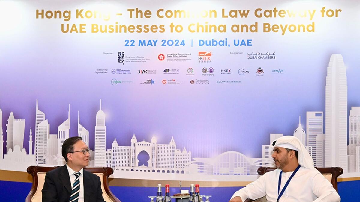 Abdullah bin Sultan bin Awad Al Nuaimi, the UAE Minister of Justice.with Paul Lam Ting-kwok, Secretary for Justice of the Hong Kong. — Supplied photo
