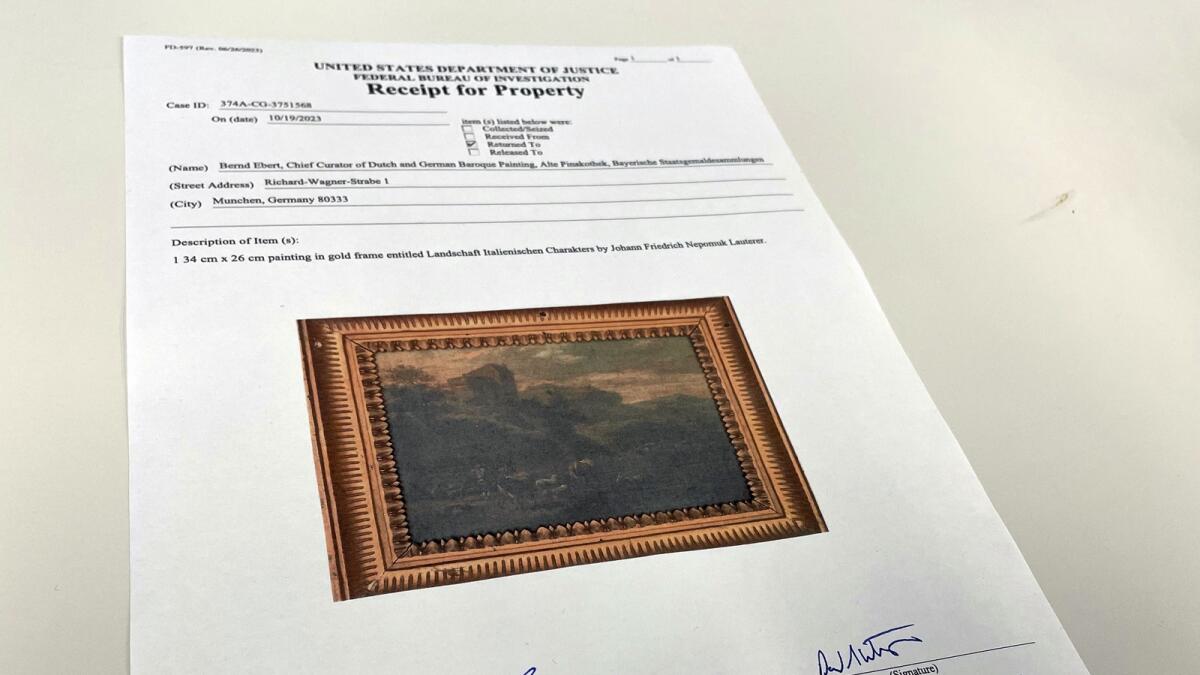 This photo shows a US Department of Justice receipt for property transferring ownership of the painting. — AP