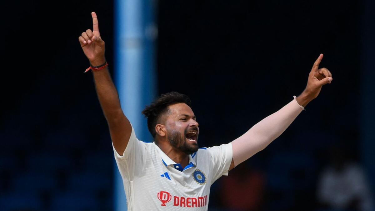 Mukesh Kumar celebrates the dismissal of Alick Athanaze of West Indies during the second Test cricket match in Port of Spain, Trinidad and Tobago, on July 23, 2023. - AFP
