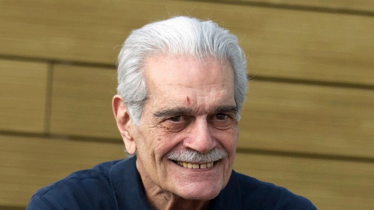 In this 2011 file photo, actor Omar Sharif poses during a photo call for the  'Medfilm, Mediterranian Film Festival' lifetime achievement award, in Rome.