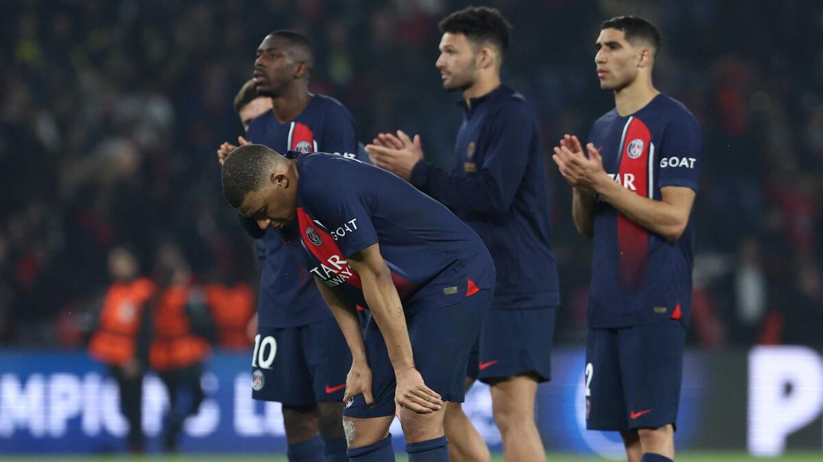 PSG forward Kylian Mbappe (centre) reacts at the end of the Champions League semifinal second leg match against Borussia Dortmund. — AFP