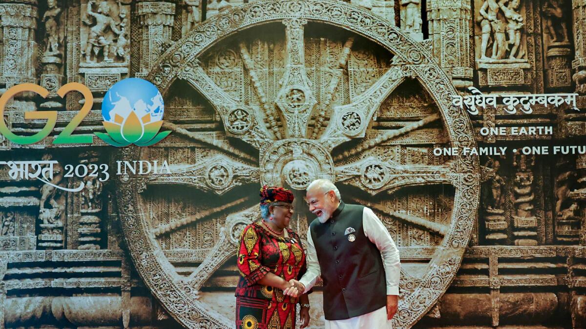 India's Prime Minister Narendra Modi welcomes WTO Director-General Ngozi Okonjo-Iweala upon her arrival at the Bharat Mandapam convention center for the G20 Summit, in New Delhi on Saturday. — PTI