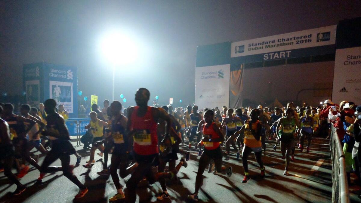 Runners take part at the Standard Chartered Dubai Marathon 2016.