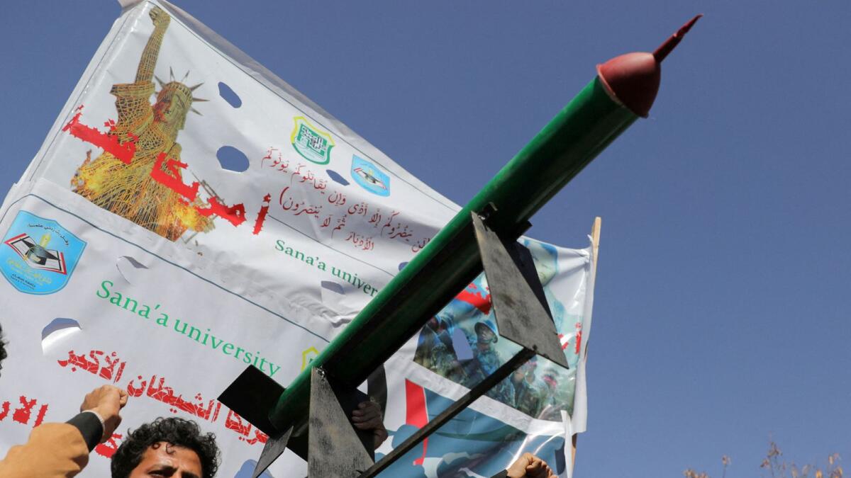 A mock missile is carried by university students during a rally to show support for  Palestinians and the recent Houthi strikes on ships in the Red Sea and the Gulf of Aden, in Sanaa. — Photo: Reuters file