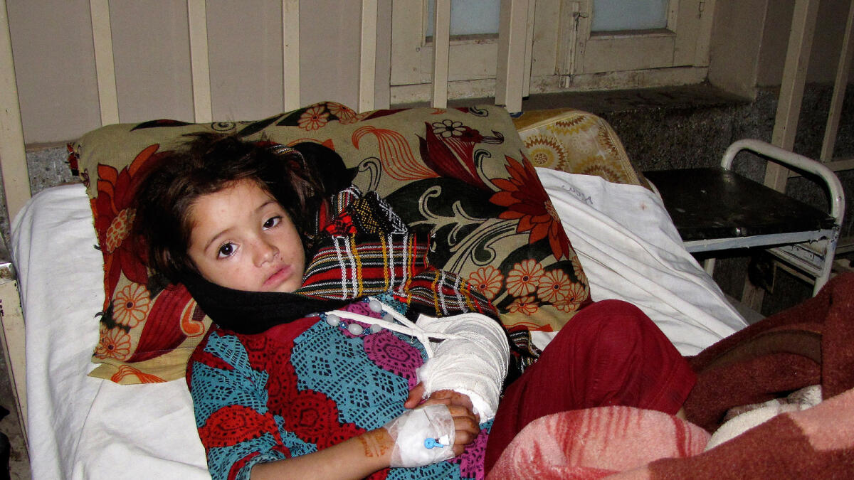 An injured Pakistani girl rests at a local hospital in Mingora