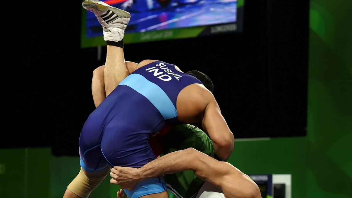 India's Sushil Kumar wrestles with Pakistan’s Muhammad Asad Butt in the men's freestyle 74kg wrestling quarterfinal bout at the Commonwealth Games 2018 in Gold Coast on Thursday.