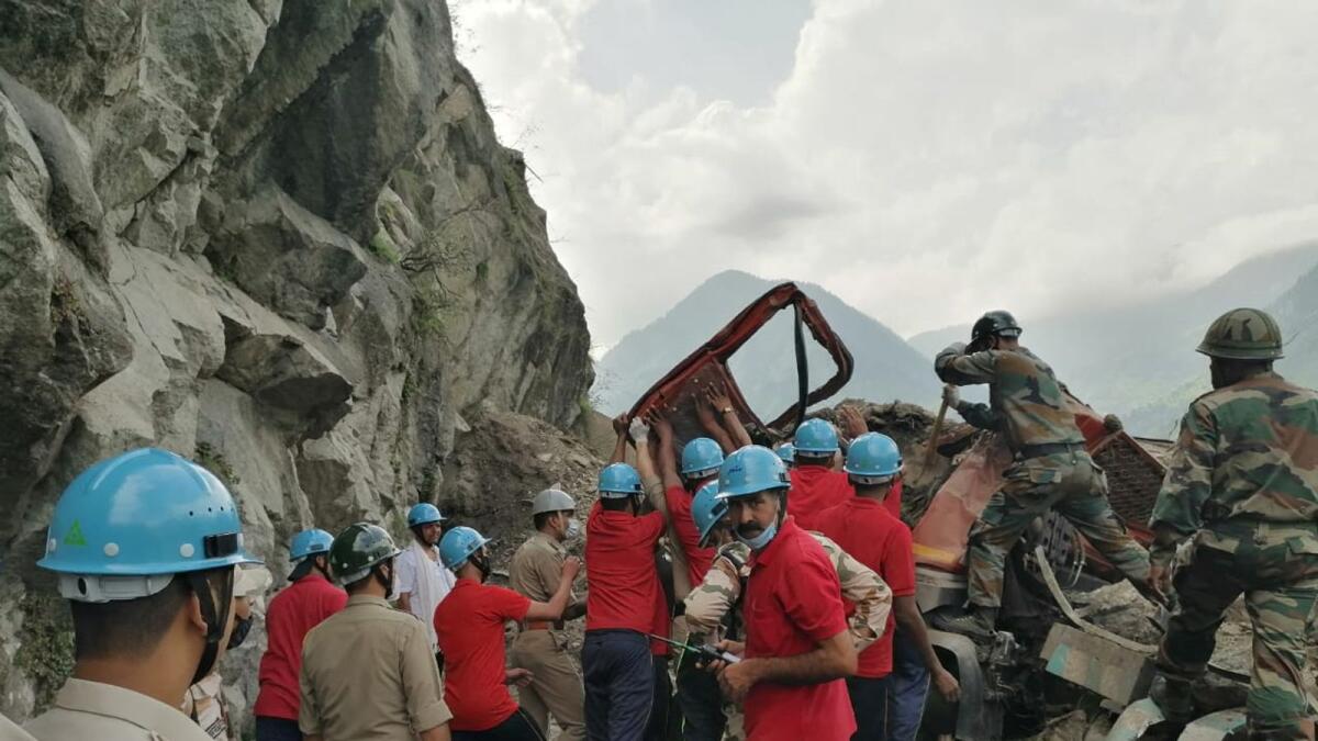 Indo-Tibetan Border Police personnel during rescue operations at the site of a landslide at the Reckong Peo-Shimla Highway in Kinnaur District in Himachal Pradesh. Photo: AFP