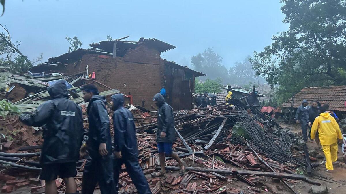 Search and rescue operation underway on Thursday after a landslide at Irshalwadi village in Raigad district. — PTI