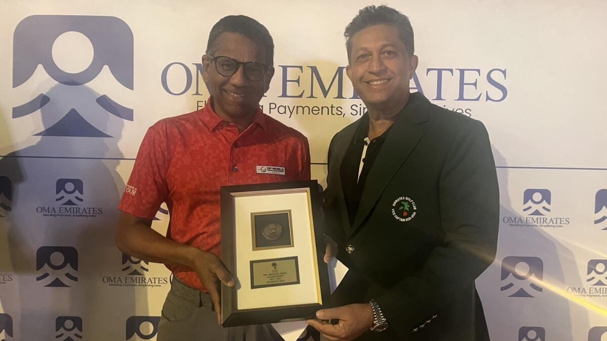 Joseph Andrade (right), Emirates Golf Club Vice-Captain,with Julius Dias winner of the December OMA Emirates Monthly Medal. - Supplied photo