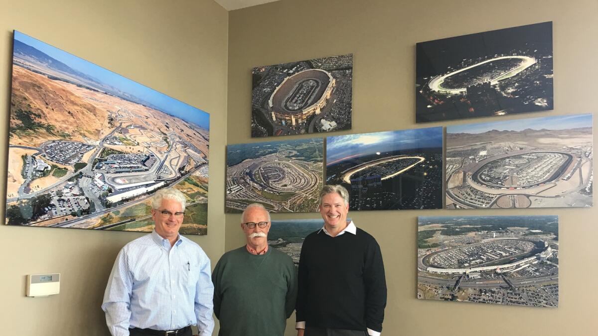 Sonoma Raceway’s top brass: Steve Page, president and general manager; Jere Starks, vice-president of facilities and operations; and Matthew Ellis, director of business development, during the private media tour in Sonoma, California. Shown behind them are images of the eight racing circuits under Speedway Motorsports.