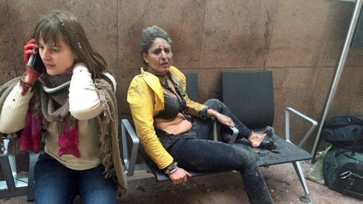 Who is the woman in Brussels attacks viral photo?