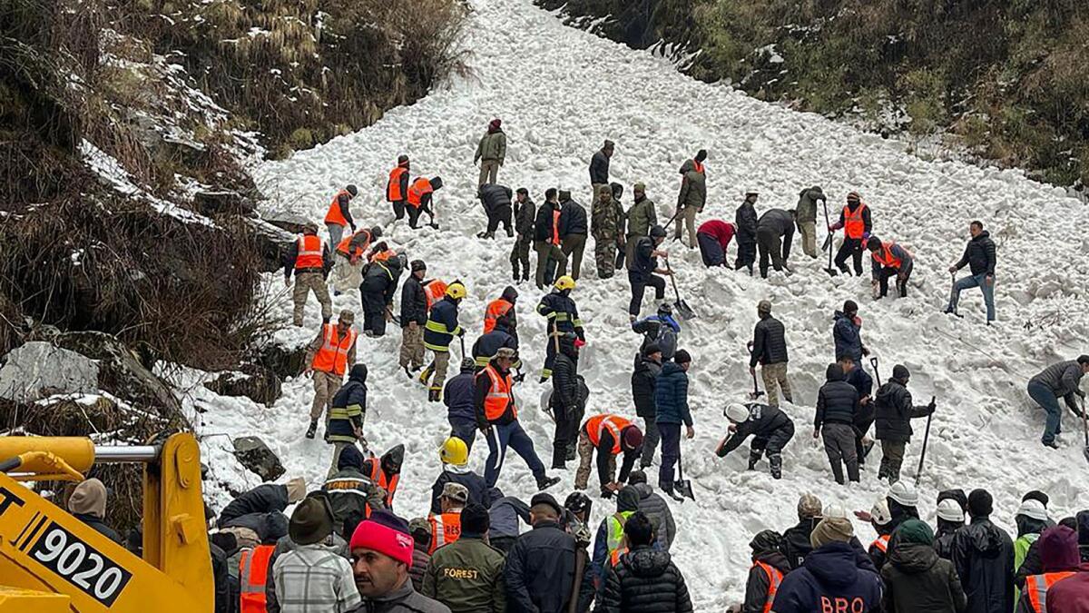 Rescue operations underway on JNM Road in East Sikkim after an avalanche on Tuesday. — PTI