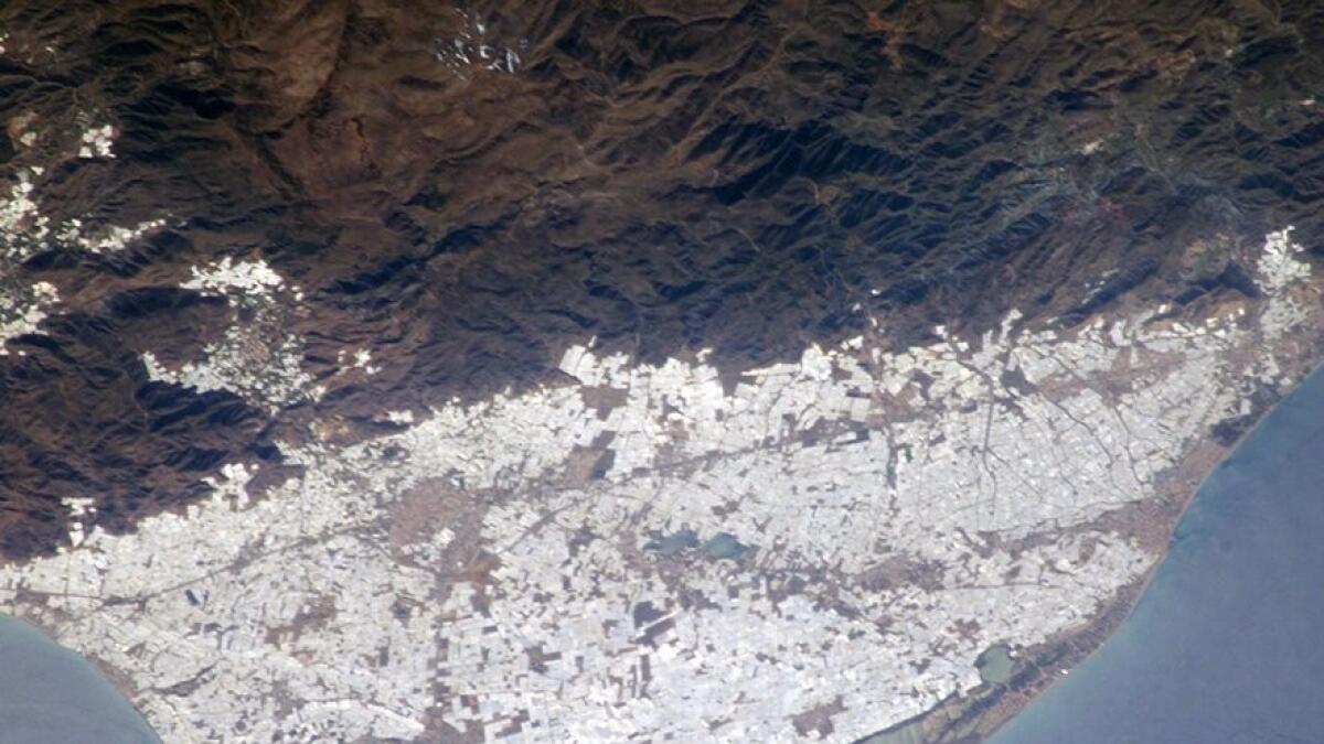 Almeria Greenhouses, Spain - a vast expanse of greenhouses spanning 64,000 acres of land can be found in the Almeria province in Spain. Millions of fruits are grown here to be exported to the rest of the world.