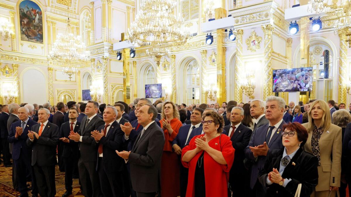 Guests watch a ceremony inaugurating Vladimir Putin as President of Russia at the Kremlin in Moscow on Tuesday. — Reuters