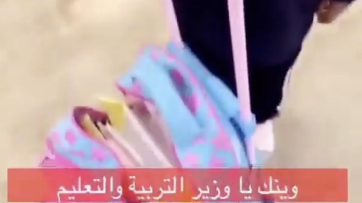 UAE minister responds to video of child reeling under bag weight