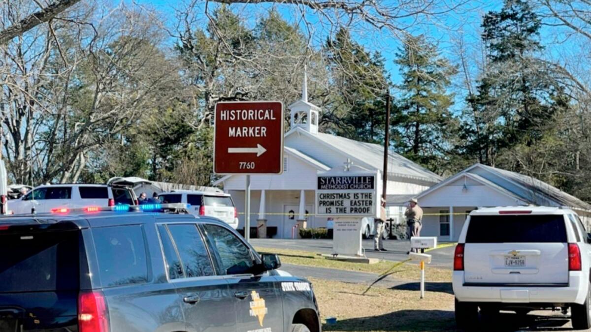 The Smith County Sheriff's Office investigates a fatal shooting incident at the Starville Methodist Church in Winona, Texas, on Sunday morning. — AP