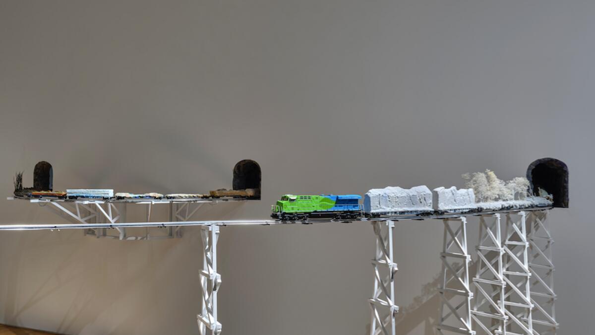 Transcontinental Divide (detail), 2020–2023 39 train cars, recycled foam, vinyl paste, acrylic paint, colored sand, eco-clear cast plastic, wood, plywood, foam, plastic, paint, branches, dirt, other natural and recycled material, dimensions variable Commissioned by The NYU Abu Dhabi Art Gallery.