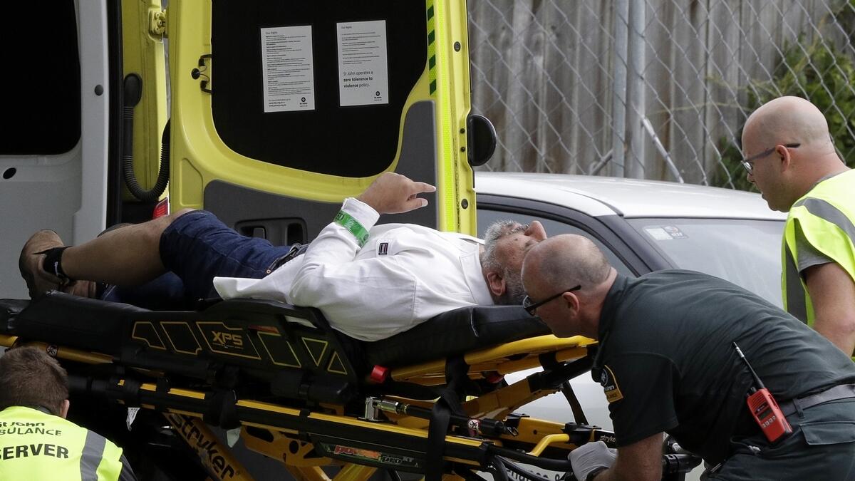 Ambulance staff take a man from outside a mosque in central Christchurch, New Zealand, Friday, March 15, 2019, following a mass shooting.-AP 