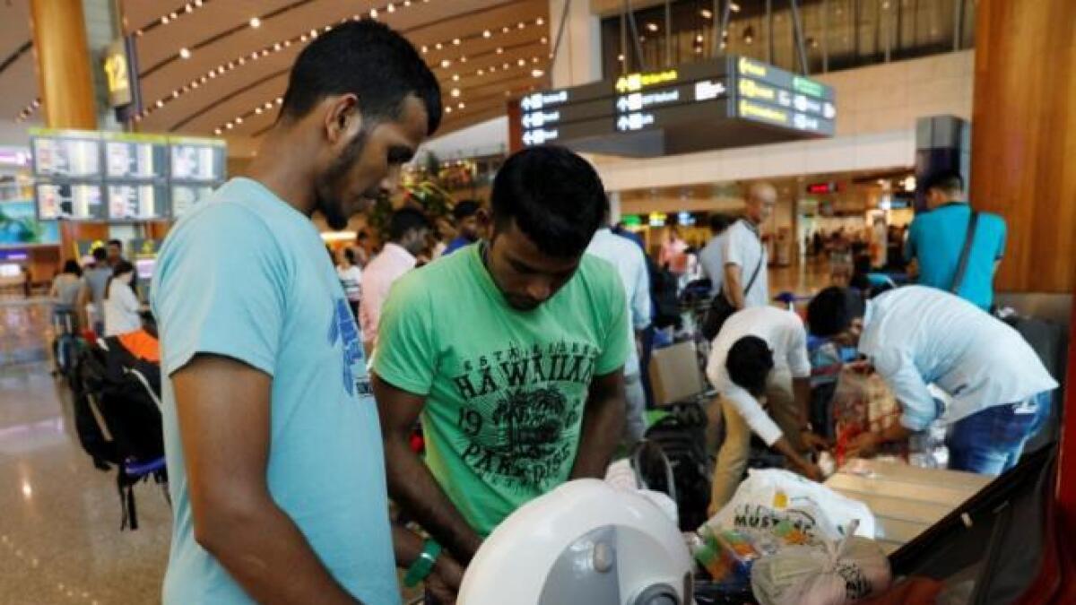 Singaporean dream sours for some Bangladeshi workers as they go home with big debts