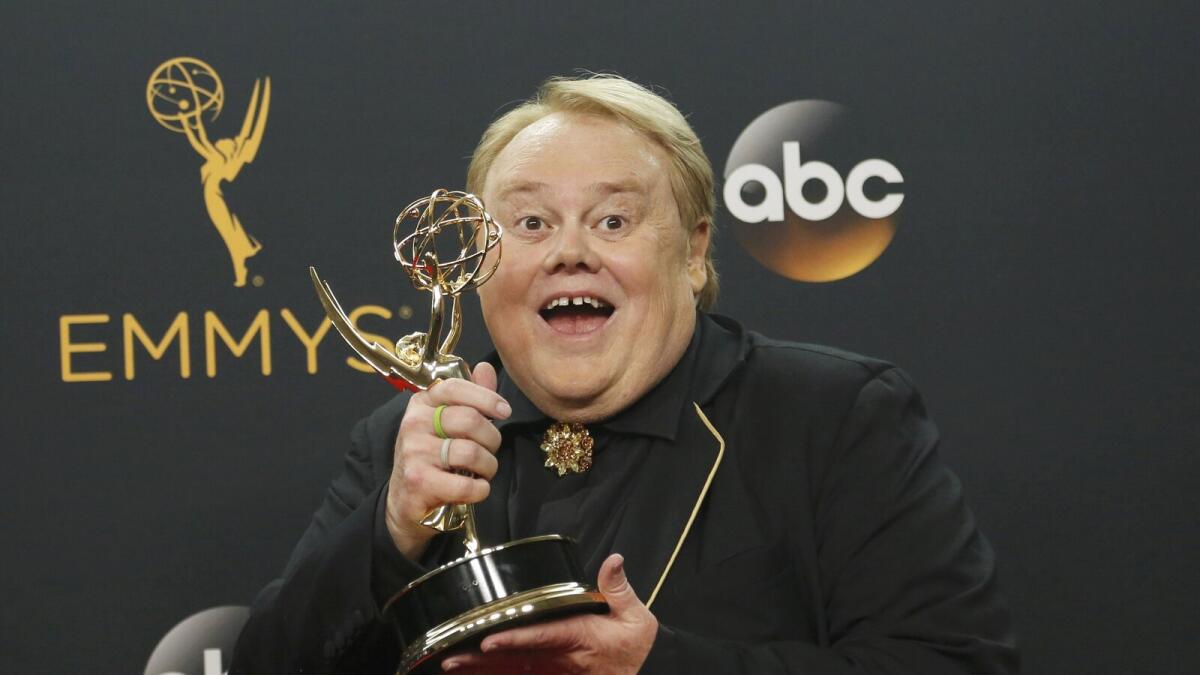 Actor Louie Anderson poses backstage with his award for Best Supporting Actor in a Comedy Series for his role on the FX series 'Baskets' at the 68th Primetime Emmy Awards in Los Angeles, California US, September 18, 2016.  Reuters