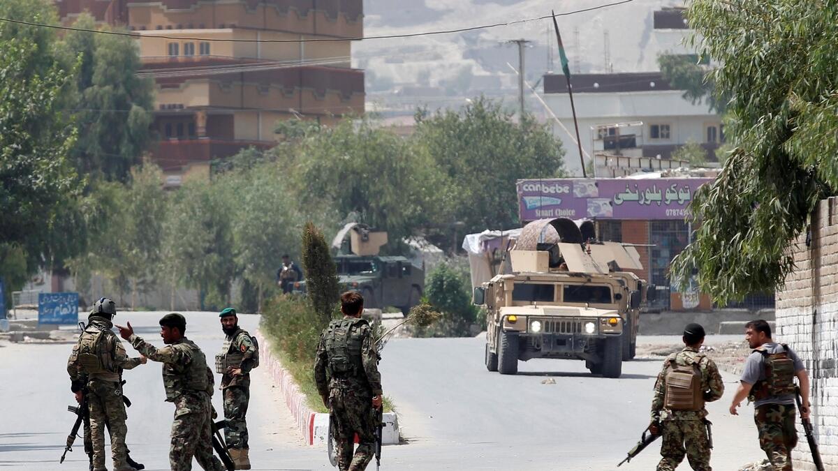 Gunmen trap Afghan workers in attack on education office 