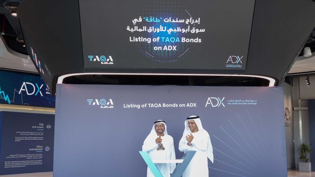Abdulla Salem Alnuaimi, Chief Executive Officer - ADX and Suhail Al Shamsi, Director Treasure, Risk and Insurance - Taqa at the listing ceremony. — Supplied picture