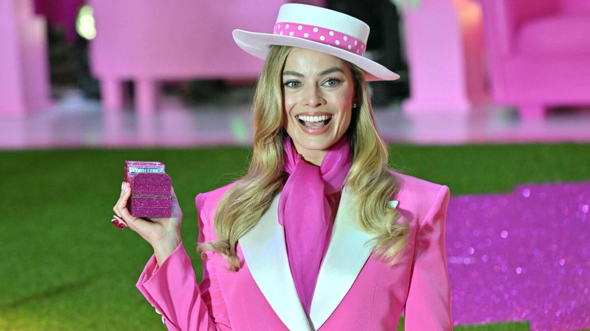Australian actress Margot Robbie poses for a photo during a pink carpet event to promote her new film 'Barbie' in Seoul on July 2. — AFP